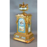 A 19th Century French Gilded and Porcelain Mounted Mantel Clock, the urn surmount above a