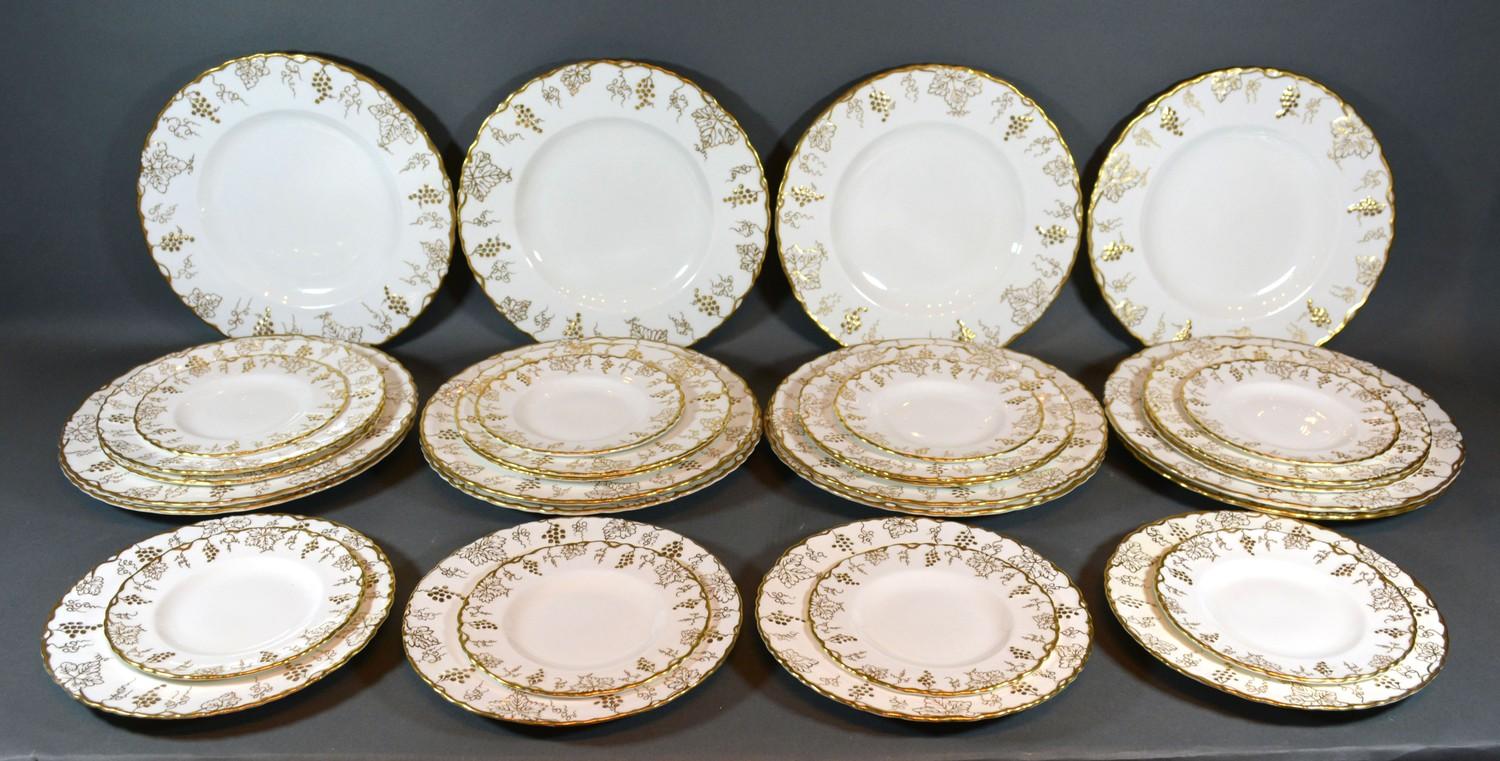 A Set of Twelve Royal Crown Derby Vine Pattern Dinner Plates together with twelve smaller plates and