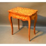 A Marquetry Inlaid Side Table, the shaped top with pull-out slide and end drawers raised upon