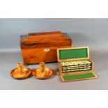 A 19th Century Mahogany Sarcophagus Shaped Tea Caddy, the hinged cover enclosing a fitted interior