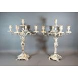 A Pair of Silver Plated Five Branch Candelabrum with shaped scroll arms and similar bases with