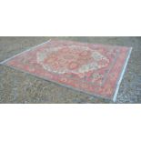 A North West Persian Style Woollen Large Rug with a central medallion within an all over design upon