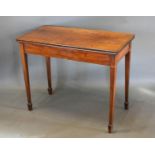 A 19th Century Mahogany Card Table, the hinged top above an end drawer raised upon square tapering