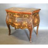 A French Style Marquetry Inlaid and Gilt Metal Mounted Small Commode with two drawers and drop