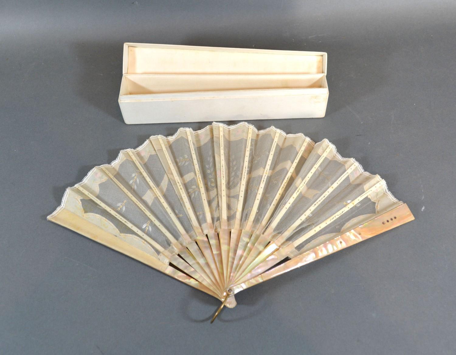 A Mother-Of-Pearl and Gauze Leaf Fan with sequin decorated mother-of-pearl guards and sticks and - Image 2 of 2