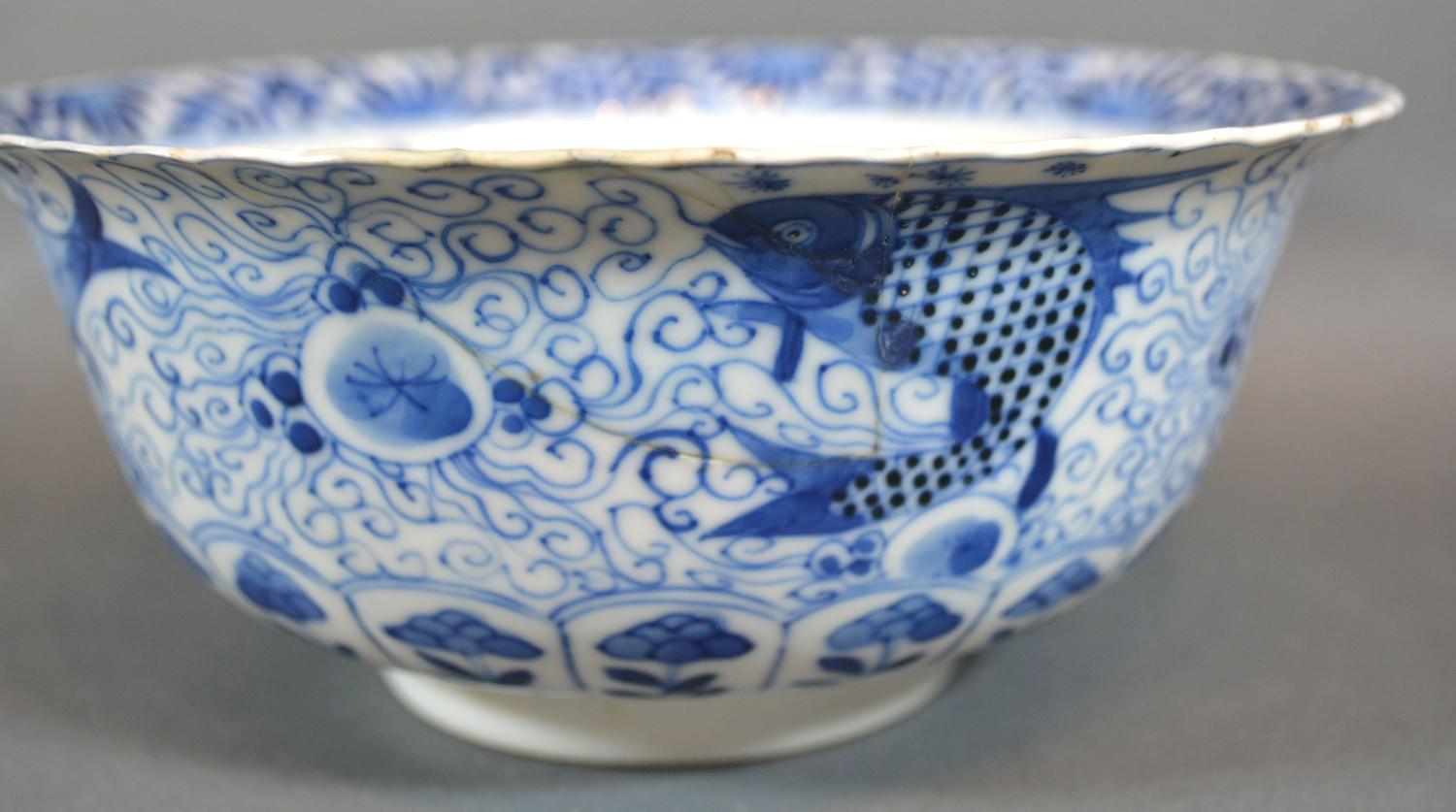 A 19th Century Chinese Porcelain Bowl decorated in underglaze blue with carp and a crab amongst - Image 5 of 8