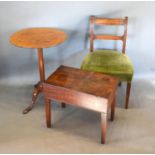 A 19th Century Mahogany Occasional Table with a circular top above a turned centre column raised