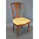 An Early 19th Century Dutch Marquetry Side Chair with an inlaid splat back above a serpentine padded