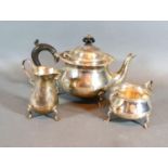 A Birmingham Silver Three Piece Tea Service comprising teapot, cream jug and two handled sugar bowl,