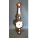 A 19th Century Mahogany Wheel Barometer Thermometer with ivory vernier and silvered dials, 94 cms