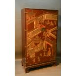 A Chinese Red Lacquered Side Cabinet with two carved doors depicting figures within landscapes,