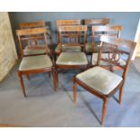 A Regency Mahogany Style Dining Suite comprising a set of seven rail backed dining chairs (six