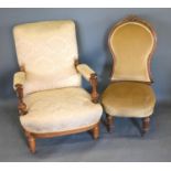 A 19th Century Walnut Drawing Room Armchair with an upholstered back and seat raised upon turned