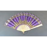An Ivory and Bone Fan with Silver Wire and Silk Leaf decorated with sequins and with carved and