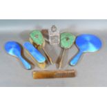 A Birmingham Silver and Translucent Enamel Three Piece Dressing Table Set together with other