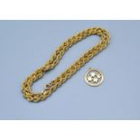 A 9ct. Gold Rope Twist Necklace together with a 9ct. Gold Pendant decorated with four stars, 12.1