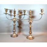 A Pair of 19th Century Sheffield Silver Three Branch Candelabrum with circular stepped bases, 54 cms