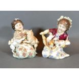 A Pair of Berlin Porcelain Figures in the form of Girls with Cats and Dogs, 14 cms tall