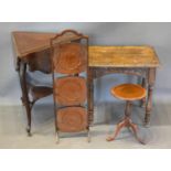 An Edwardian Mahogany Two Tier Occasional Table of Triangular Form together with a three tier cake