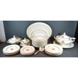 A Carlton Shape Dinner Service comprising plates, two covered tureens and other items