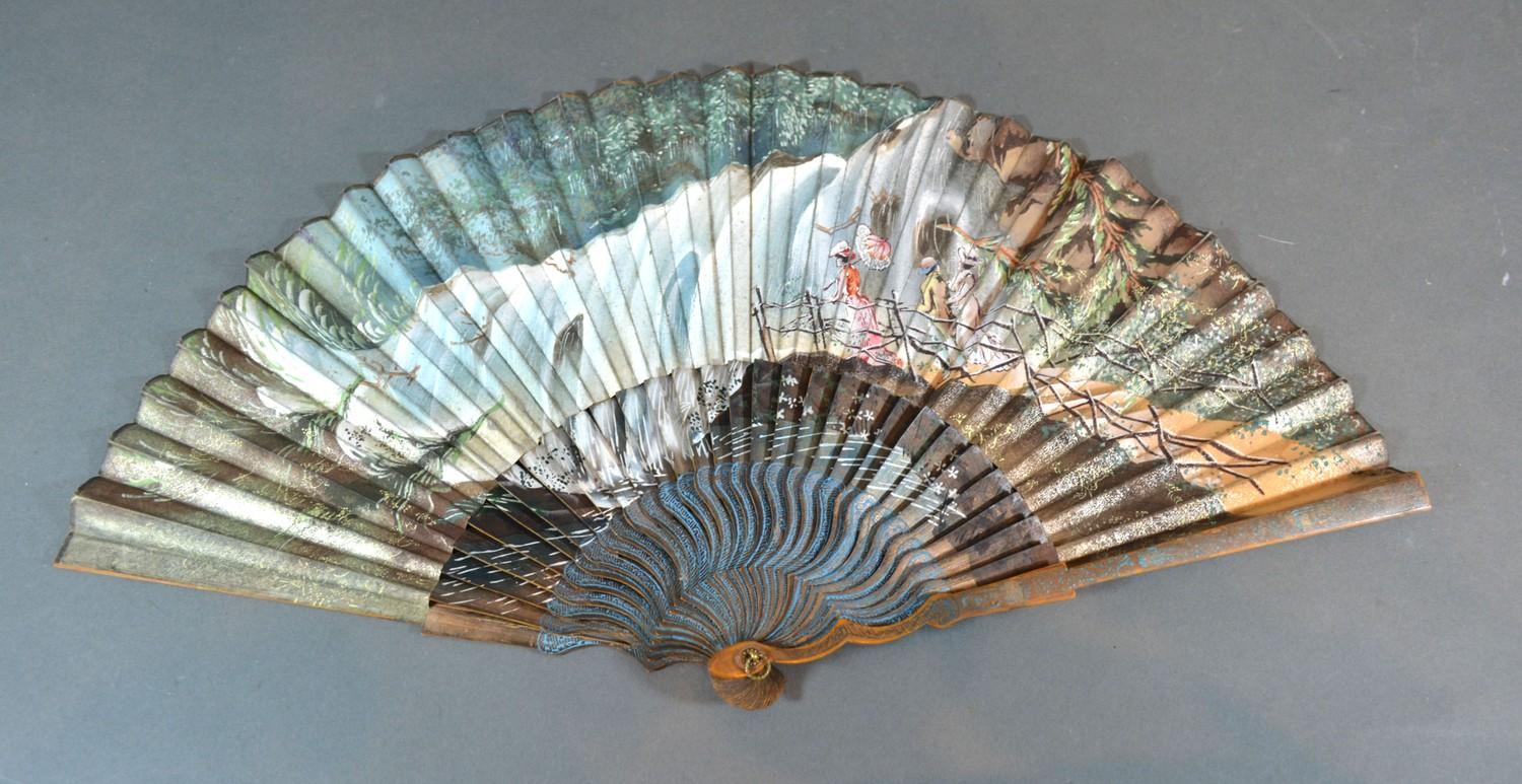 A Mid 18th Century Lined Paper Leaf Fan with serpentine wooden sticks, a hand painted leaf depicting