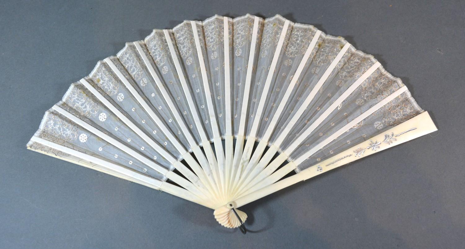 An Ivory and Gauze Leaf Fan with carved ivory sticks and guards and with sequin decorated gauze leaf - Image 2 of 3