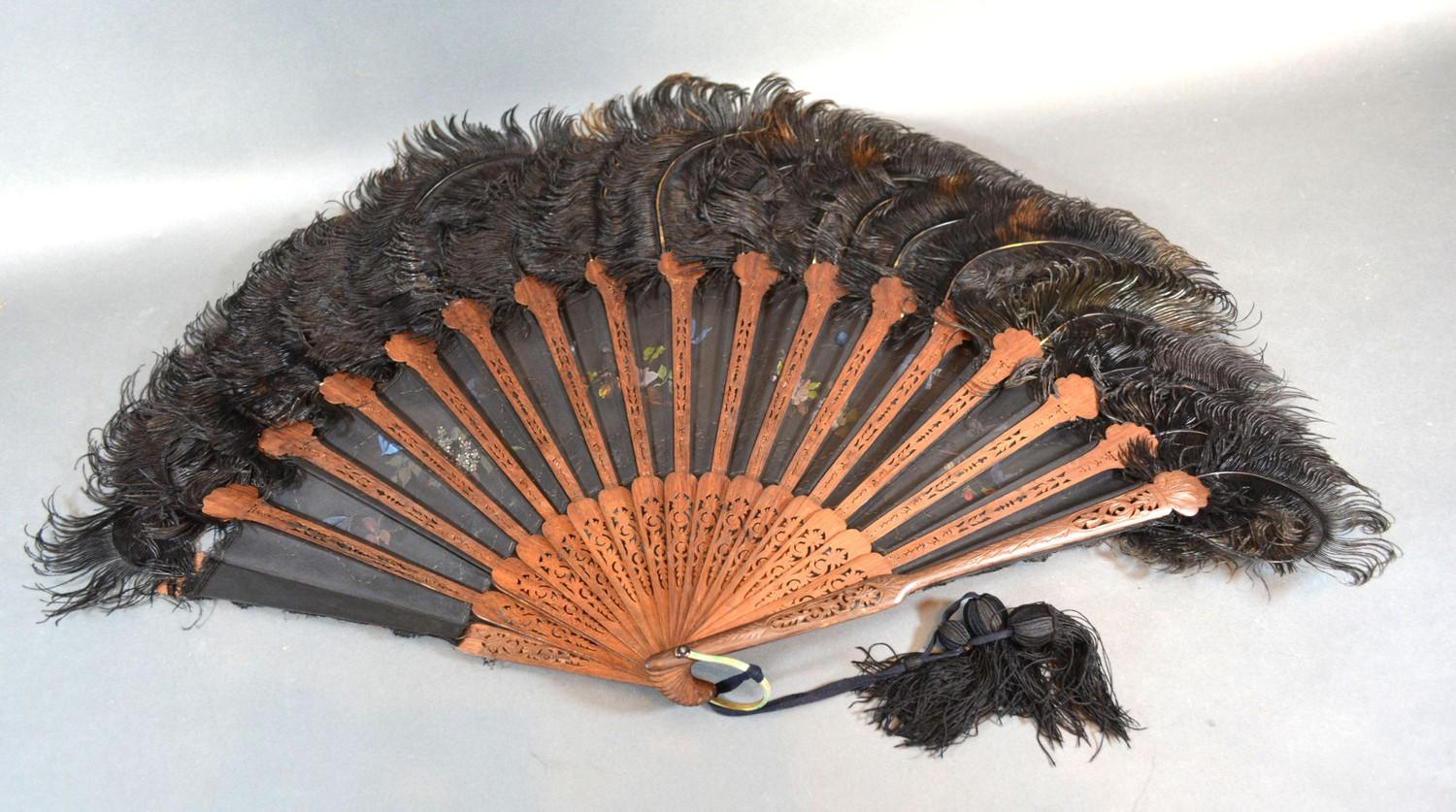 An Early 19th Century Carved Wooden Lace and Feather Fan with carved and pierced sticks and guards - Image 2 of 2