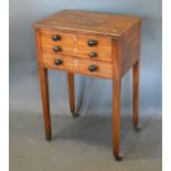 A Regency Mahogany Work Table, the line inlaid top above two drawers simulated as three drawers with