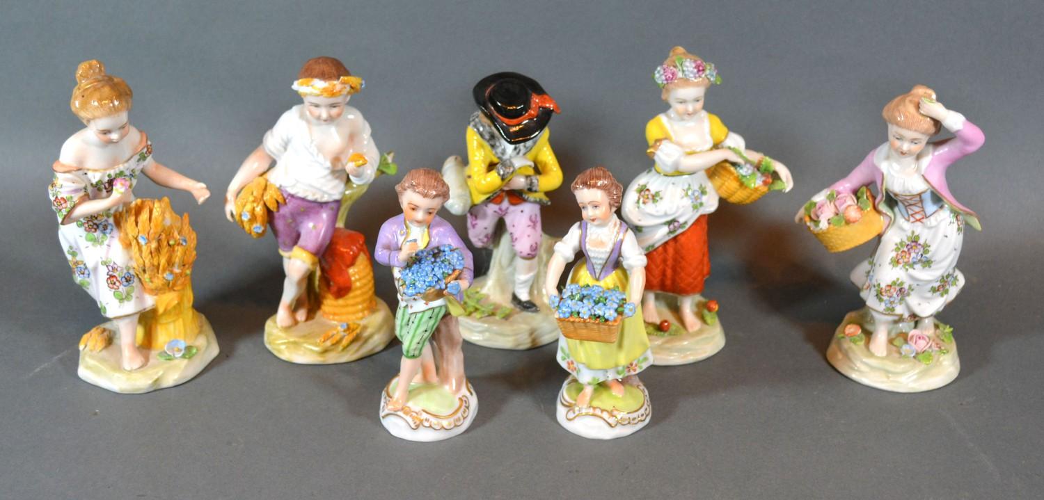 A Group of Five German Porcelain Figures together with a similar smaller pair of German porcelain