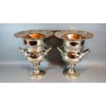A Pair of Large Two Handled Wine Coolers decorated Grapevine upon circular pedestal bases, 36 cms