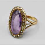 A 9ct Gold Amethyst And Pearl Set Ring Of Oval Form, 6.2 grams, ring size R