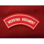 Australian Werriwa Regiment cloth shoulder title, white on red.