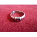 Silver Ring - Plain Bodied silver ring with rectangular red stone-ring size unknown
