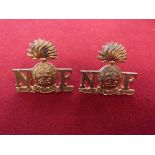 Royal Northumberland Fusiliers Shoulder Titles (Gilding-metal), two lugs each.
