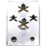 Machine Gun Corps WWI Cap Badge, Collar Badge Pair, Motor Machine Gun Corps and two buttons.