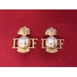 Royal Irish Fusiliers Shoulder Titles (Gilding-metal), two lugs each.