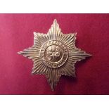 Irish Guards Other Ranks Forage Cap Badge (Gilding-metal). K&K: 914, two lugs.