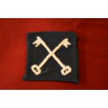 British WWII East Surrey Epaulette title for the battledress, an excellent example