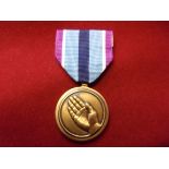 United States of America Armed Forces Humanitarian Service Medal, makers marked on the pin device '