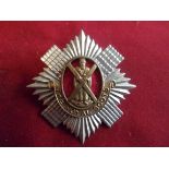 The Royal Scots (Lothian Regiment) WWI Forage Cap Badge (Bi-metal with red backing), two lugs. K&