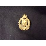 7th/11th Hussars Canadian WWII Cap Badge (Gilding-metal), two lugs.