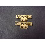 Lancashire Regt (Prince of Wales's Volunteers) Shoulder Title Pair (Gilding-metal), two lugs each.