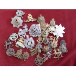 Mixed batch of cap badges, shoulder titles etc some A/F, useful lot, 35 approx.