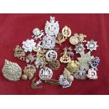 Mixed batch of cap badges, shoulder titles etc some A/F, useful lot, 35 approx.