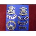 Welsh Units-three cap badges WWI Welsh, WWII Welsh, + South Wales Boarders and shoulder titles -