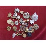 Mixed batch of cap badges, shoulder titles etc some A/F, useful lot, 35 approx.