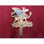 Buffs (East Kent) cap badge and pair shoulder titles (W744)