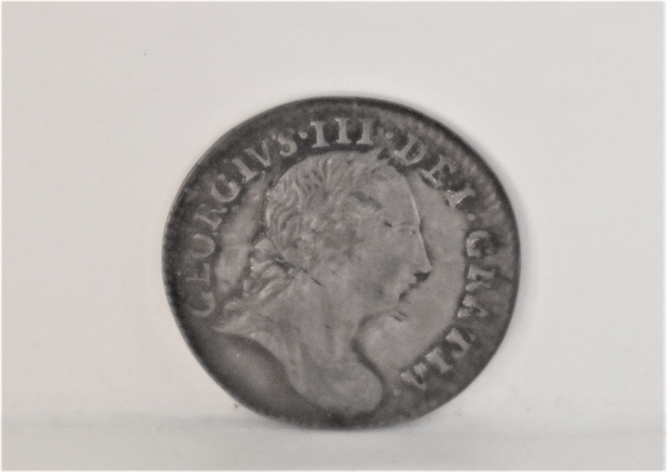 George III 1762 Threepence, EF, dark toned.