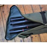 Large fishing hold all bag with various contents including rod inserts and an umbrella. Used