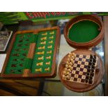 Pair of small carved wooden travel chess sets. Nice find. Both complete